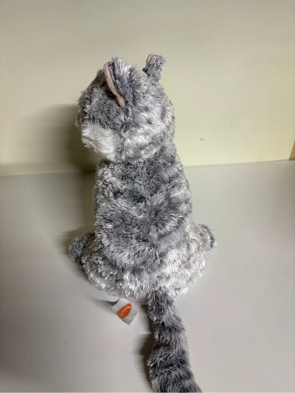 Melissa & Doug Greycie Tabby Cat, featuring soft grey and white patterned fur